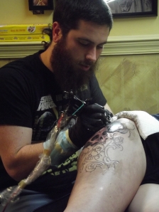 Dan Fisher tattooing client Nancy.